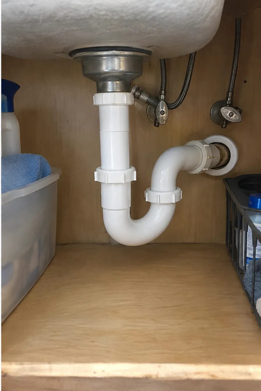 Clean new PVC drain assembly after repair